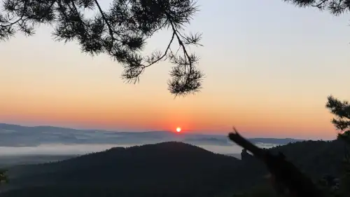 sunrise on top of a mountain